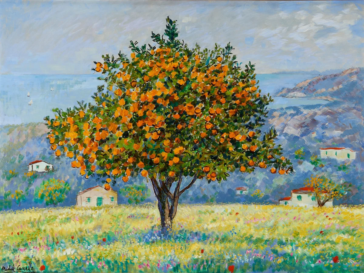 Oranges in a basket by the sea